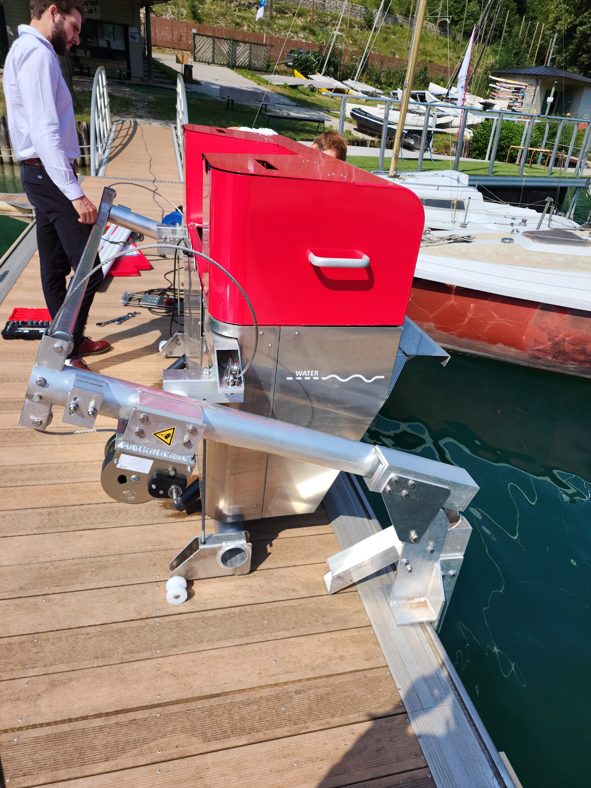 Floating marine debris collection systems